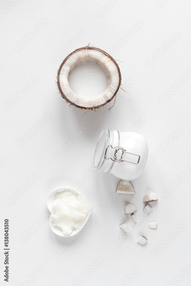 organic cosmetics with coconut on white background top view mockup