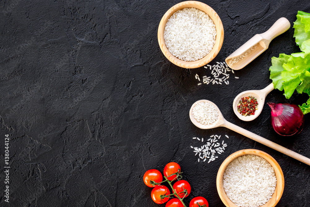 ingredients for paella on dark background top view