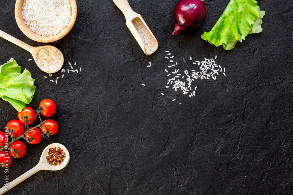 ingredients for paella on dark background top view