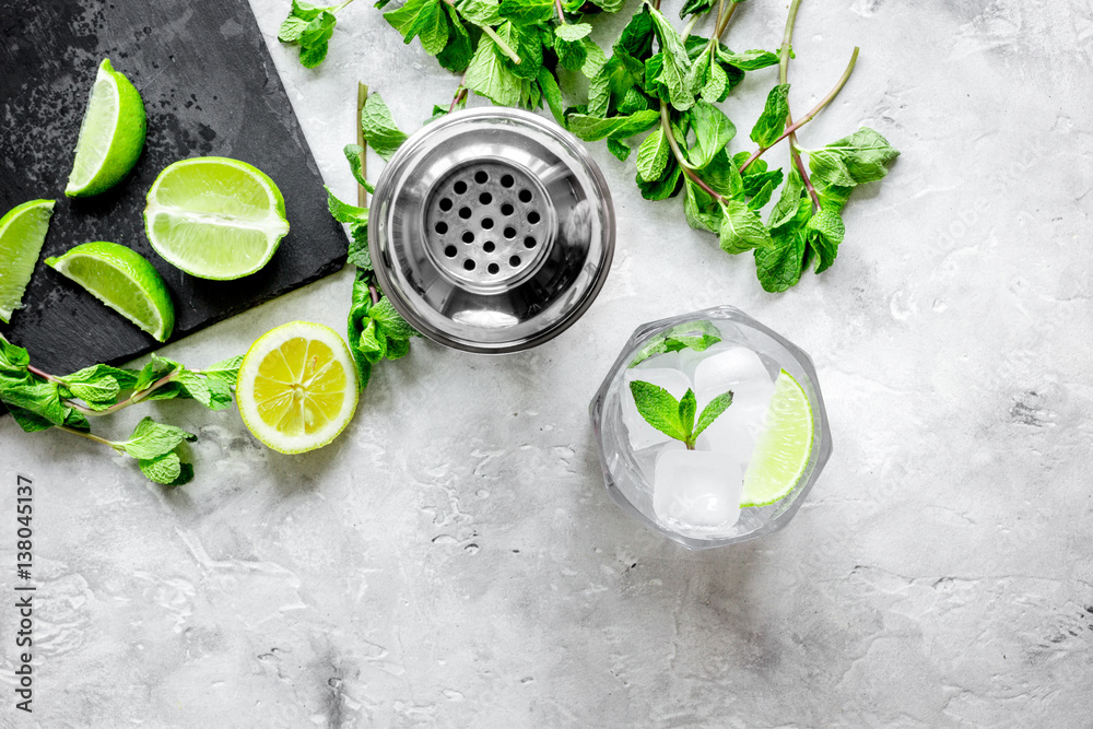 making mojito on stone background top view