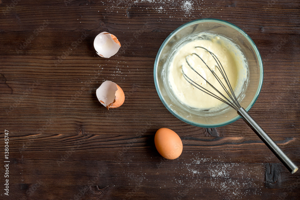 cooking pancake on wooden background top view ingredients for making