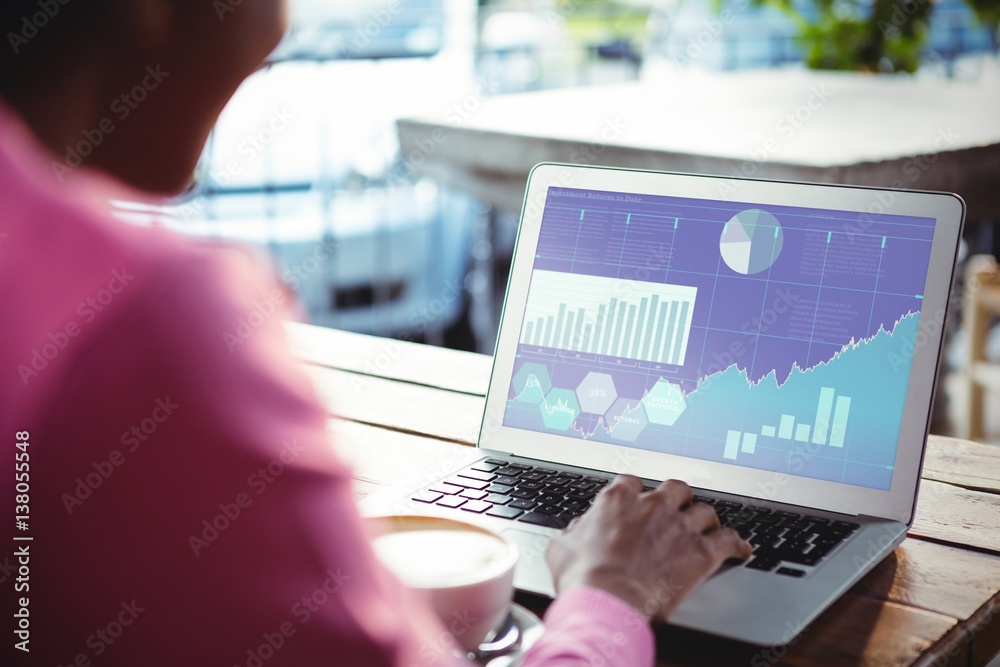 Composite image of business interface with graphs and data