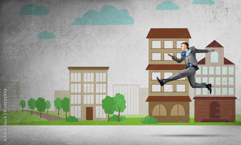 Businessman jumping high