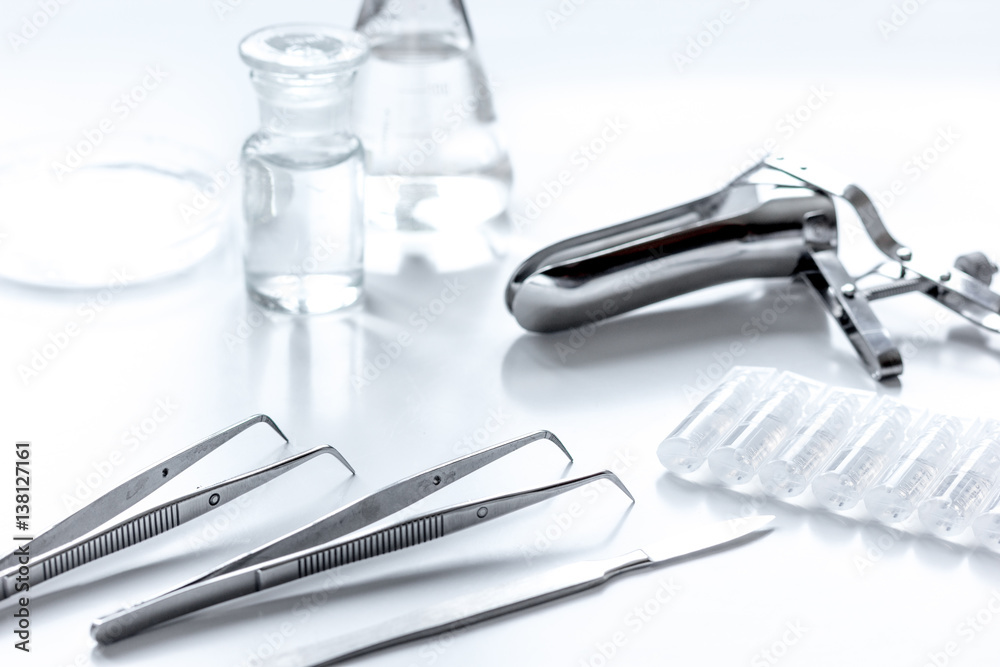 instruments of gynecologist on white background