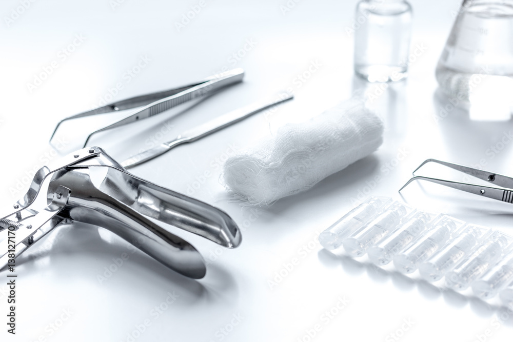 instruments of gynecologist on white background