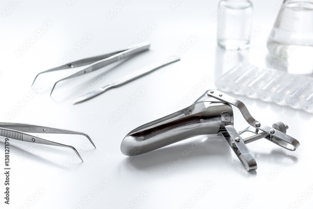 instruments of gynecologist on white background