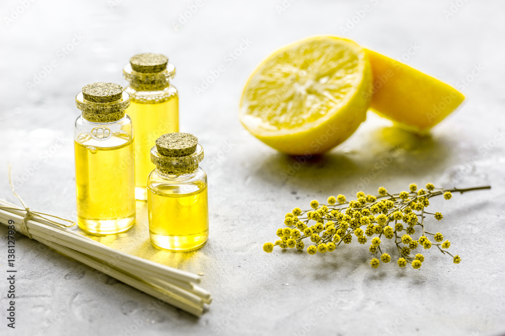 Natural cosmetic with bath set with organic oil on gray background