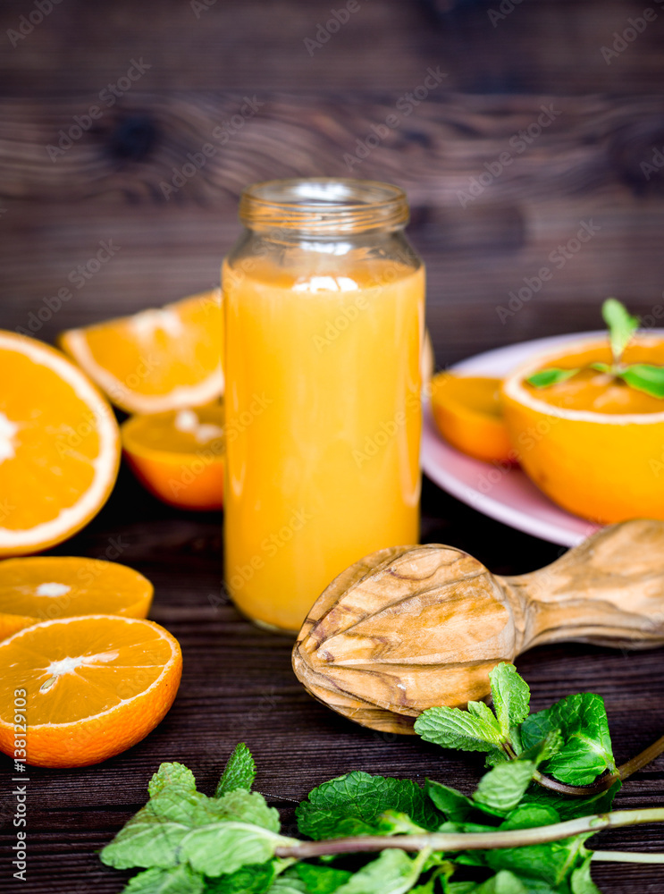 healthy morning with orange juice in bottle on kitchen background