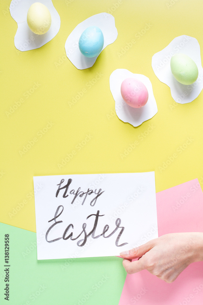 Easter concept on yellow background top view mockup