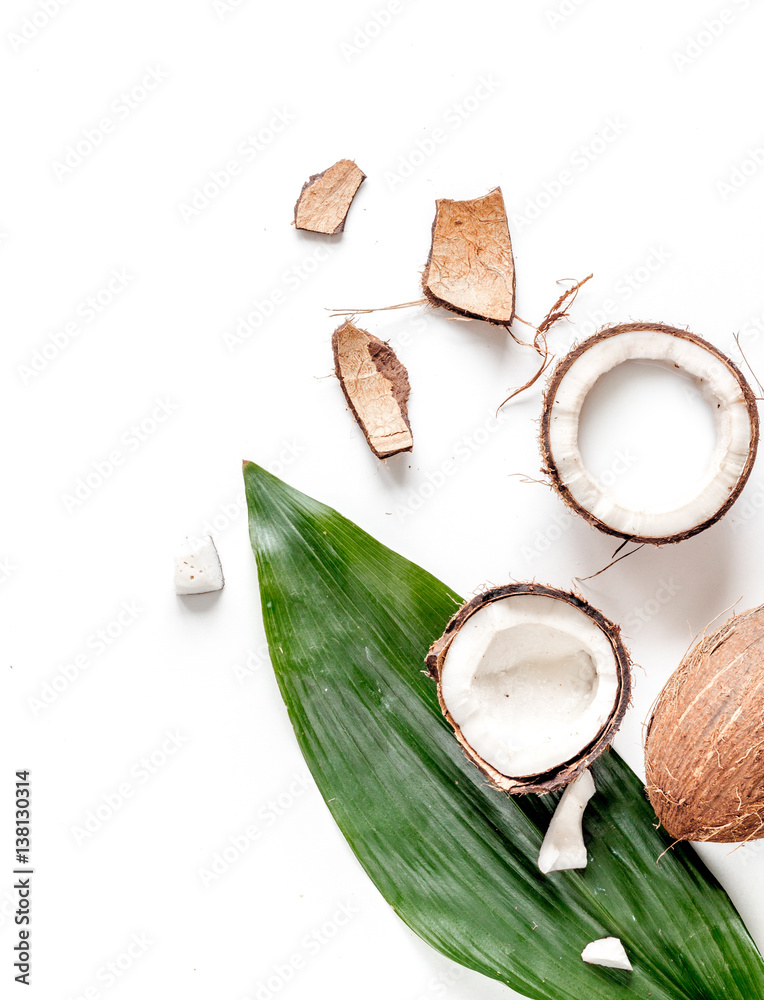 cocktail with coconut on white background top view