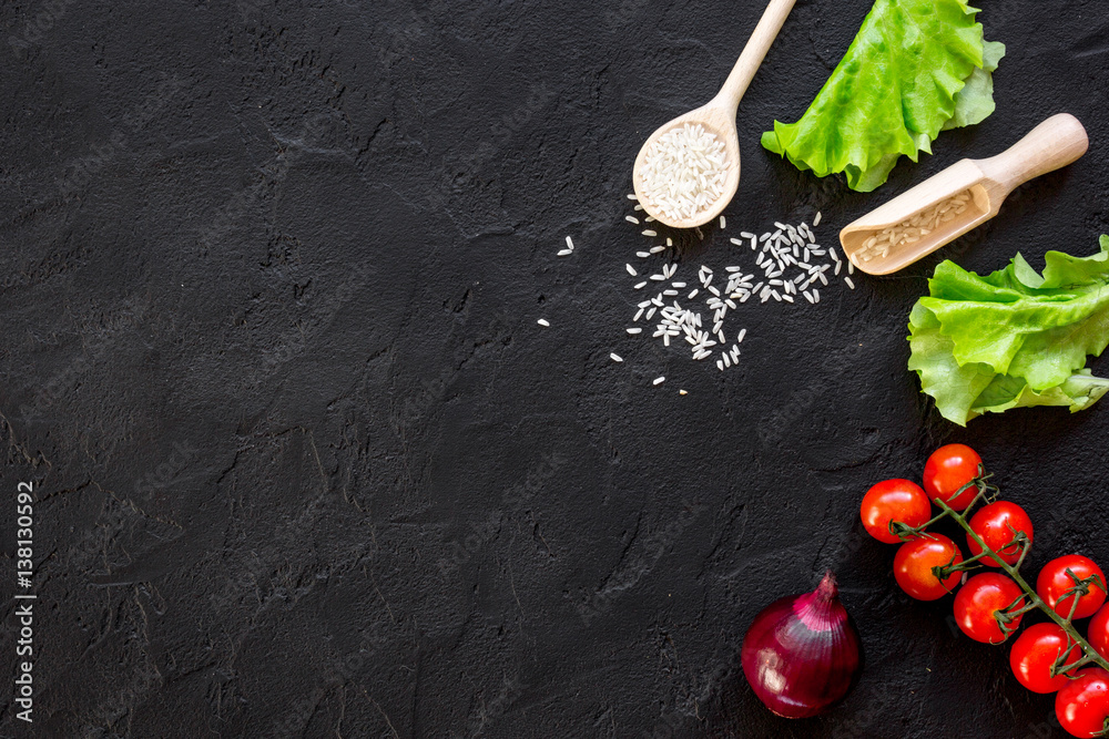 ingredients for paella on dark background top view