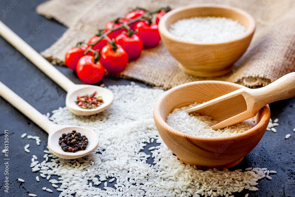 ingredients for paella on dark background