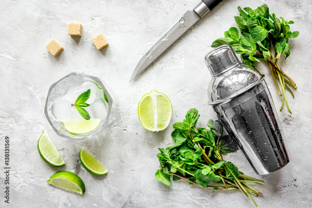 making mojito on stone background top view