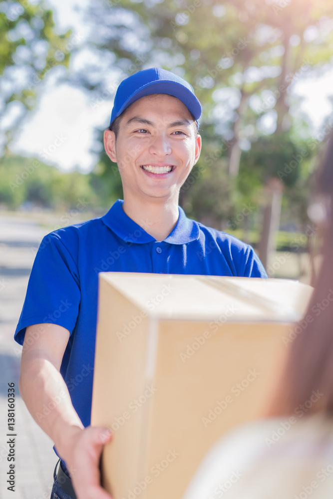 deliveryman stand and smile