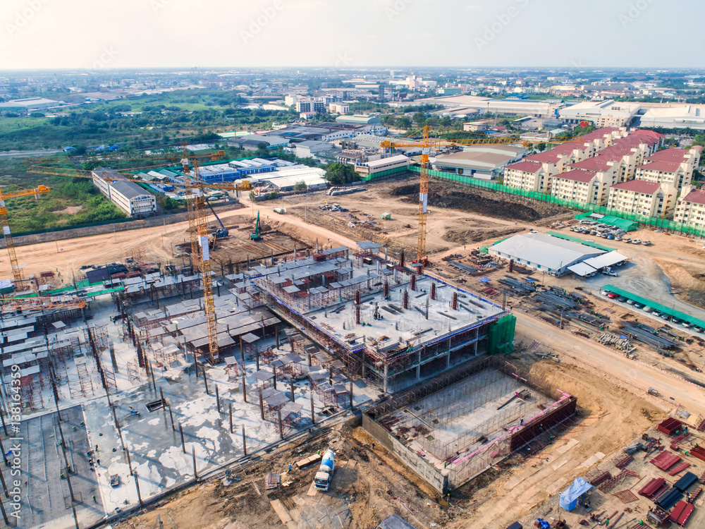 Construction site with cranes. Construction workers are building.Aerial view.Top view.