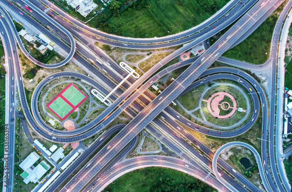 The light on the road  roundabout at night and the city in Bangkok, Thailand. Aerial view, Top view.