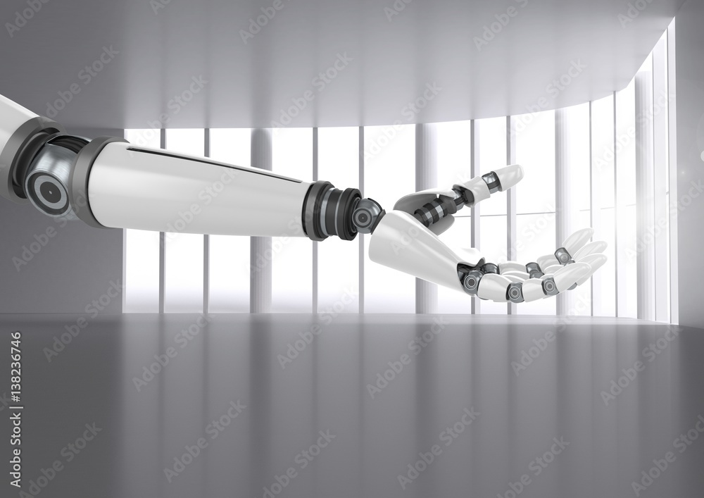 Composite image of Robot hand against modern large room