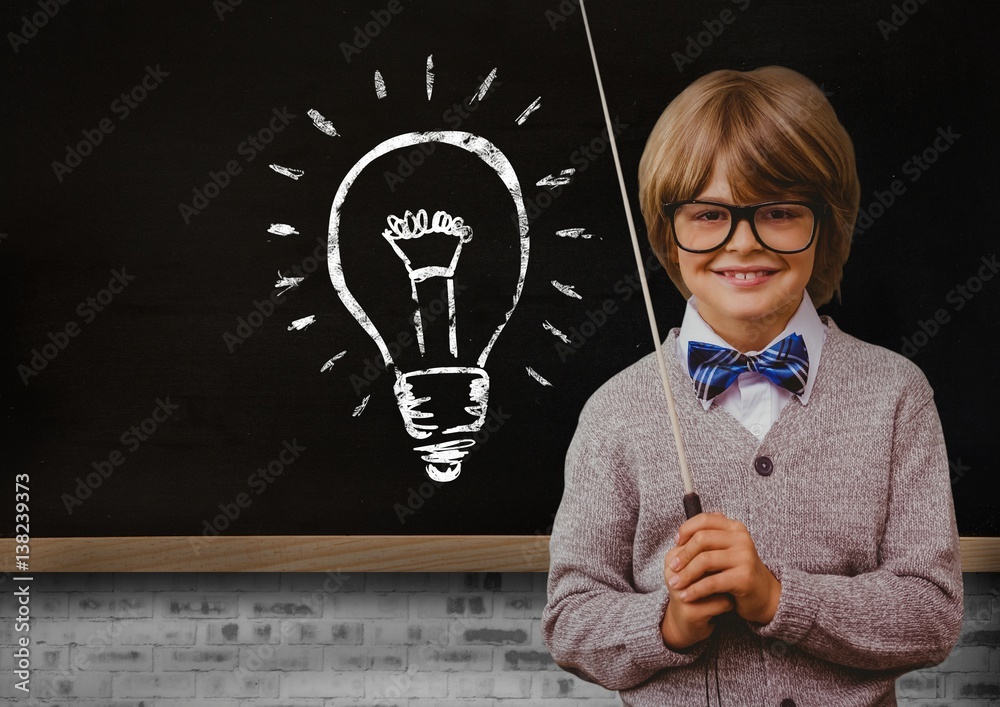 kid and blackboard with lightbulb against a black background