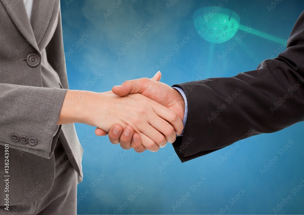 Businessmen Shaking Hands against a Light Blue Ray background  