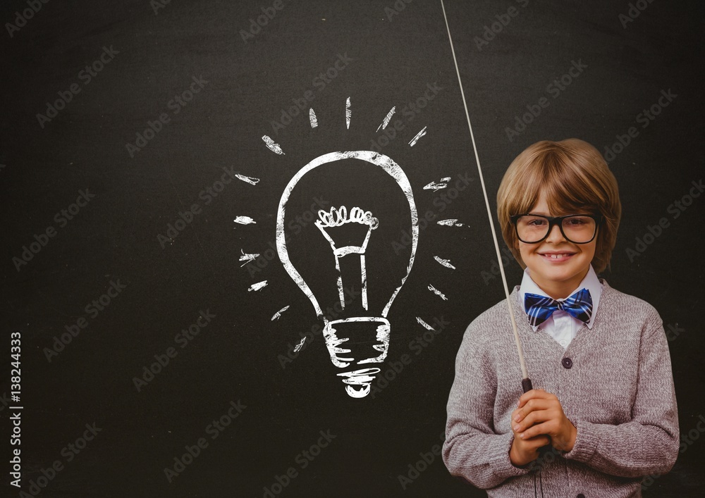 kid and blackboard with lightbulb against a black background