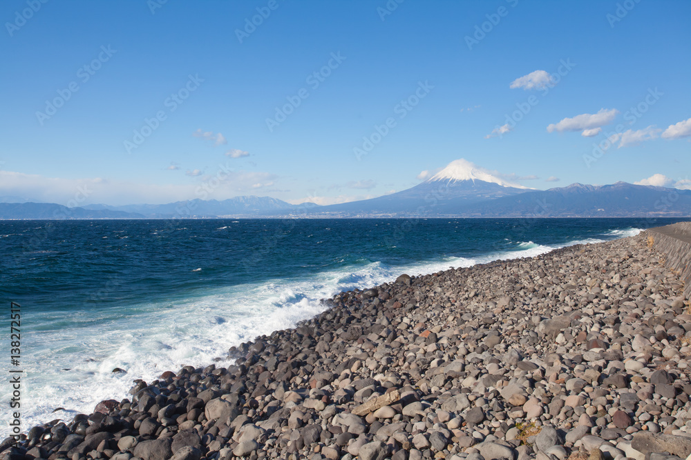 Mountain fuji and Japan sea in winter seen from Izu city , Shizuoka prefecture