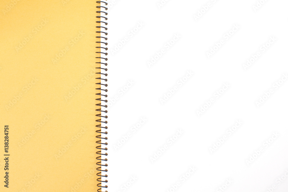 Yellow note book isolated on a white background