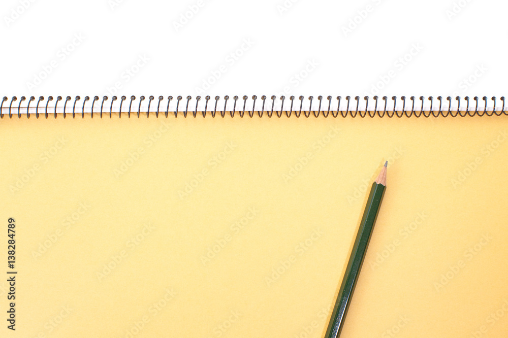 Yellow note book isolated on a white background