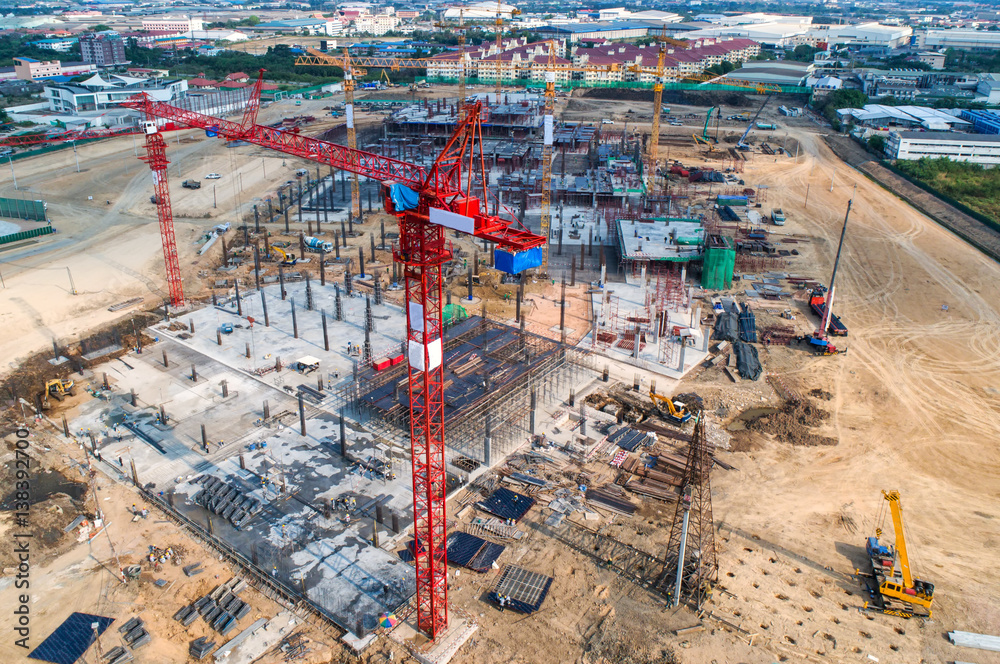 Construction site with cranes. Construction workers are building.Aerial view.Top view.