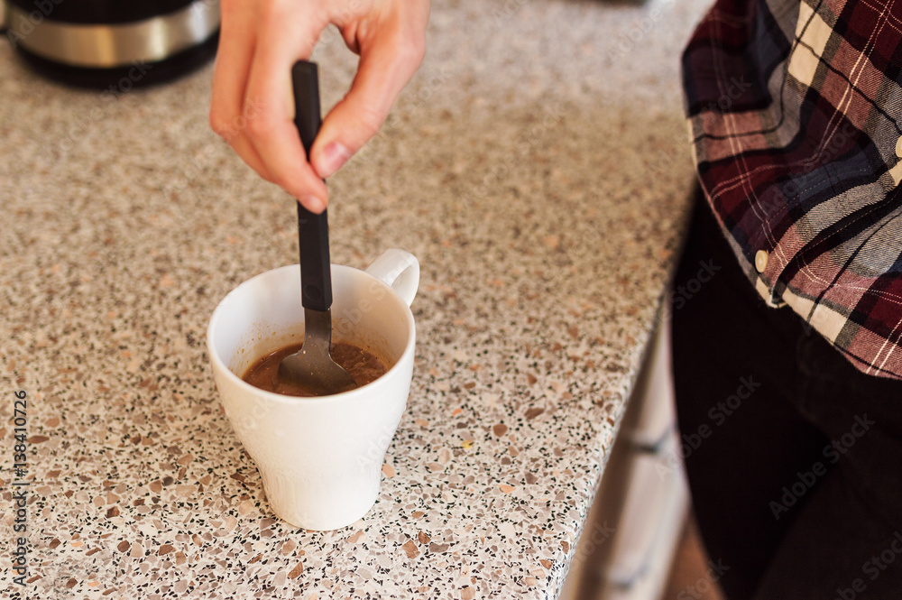 Girl making coffee at home