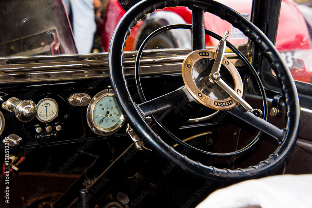 Steering wheel and a dashboard of a vintage car