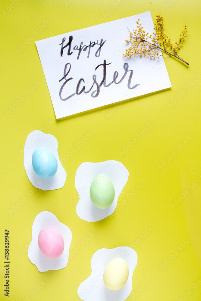 Easter concept on yellow background top view mockup