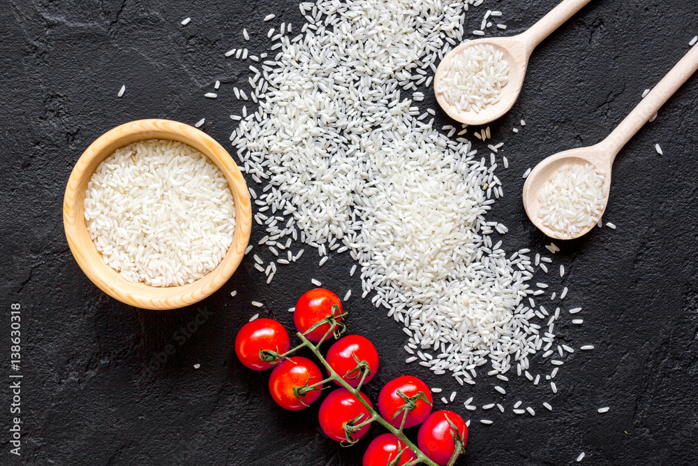 ingredients for paella on dark background top view