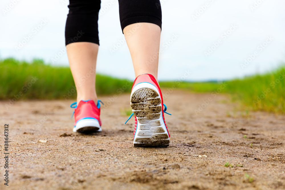 Runner jogging at the sand