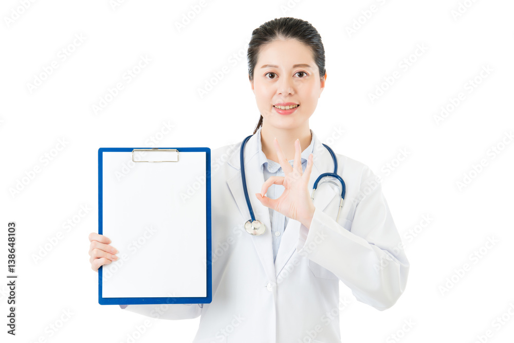 beauty asian doctor ok gesture showing blank clipboard