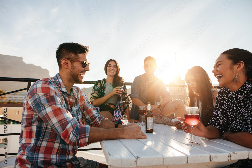 Young people having cocktail party