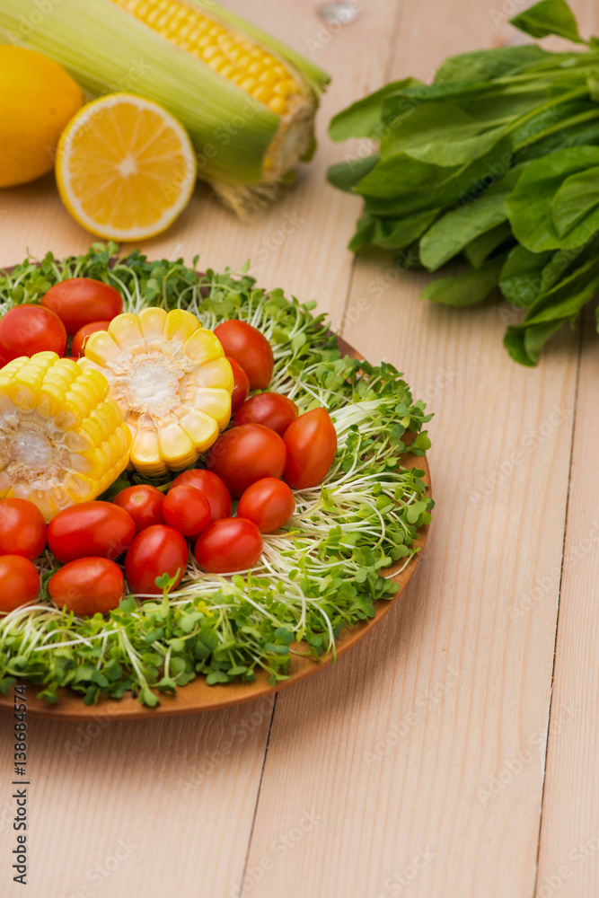 Homemade fresh green vegetable salad on table.