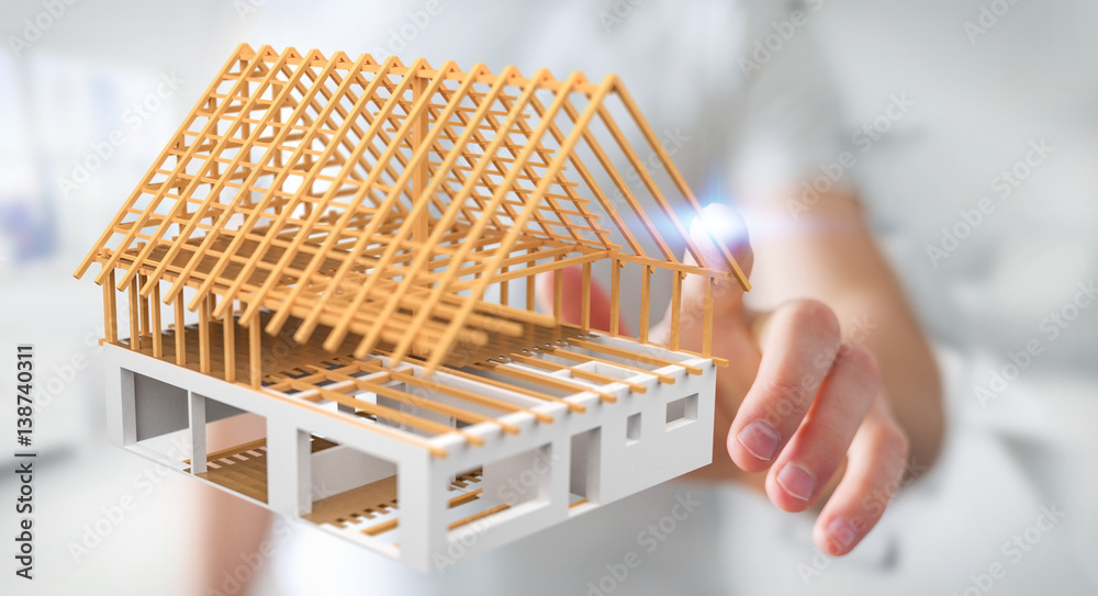 Businessman touching 3D rendering unfinished plan house with his finger