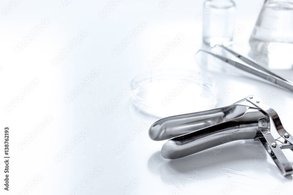 instruments of gynecologist on white background