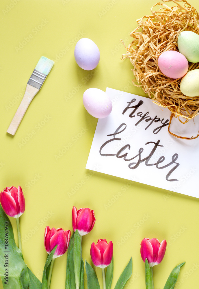 Easter concept on yellow background top view mockup