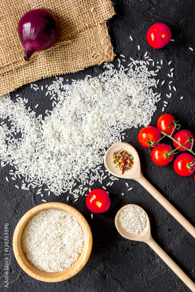 ingredients for paella on dark background top view