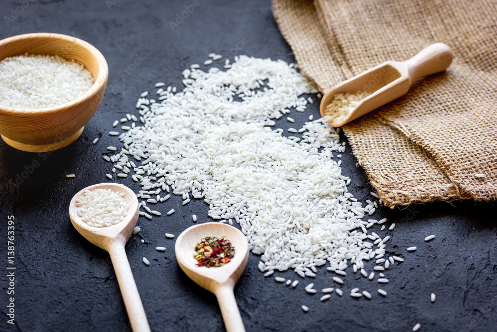 ingredients for paella on dark background