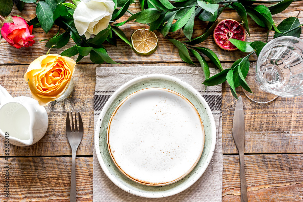 ceramic tableware top view on wooden background mock up