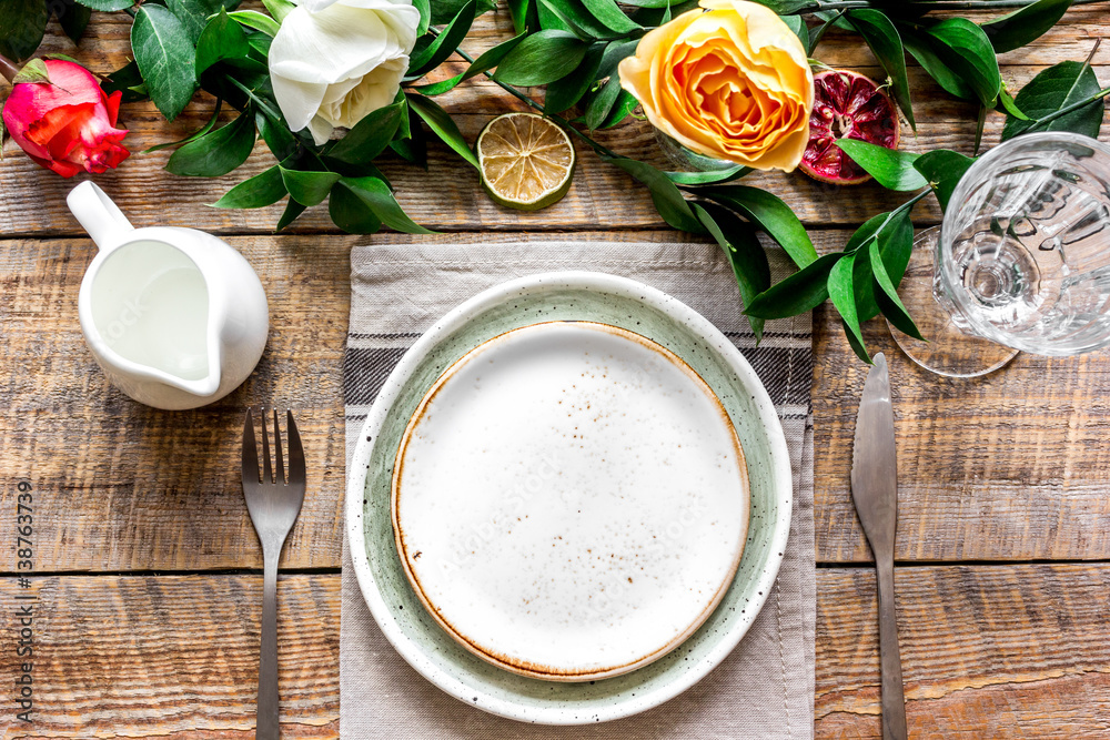 ceramic tableware top view on wooden background mock up