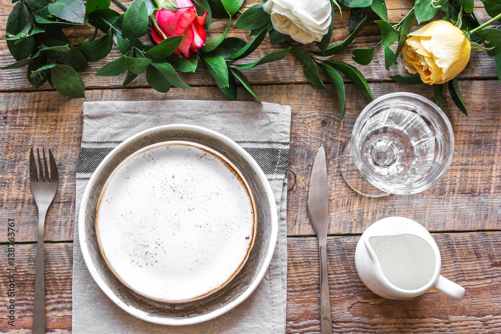 ceramic tableware top view on wooden background mock up