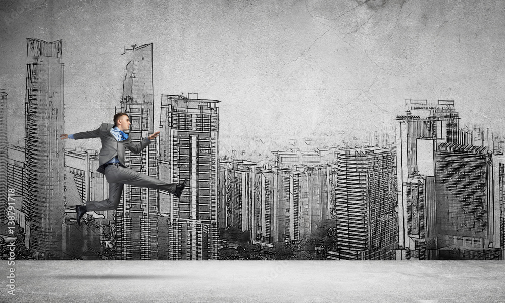 Businessman jumping high