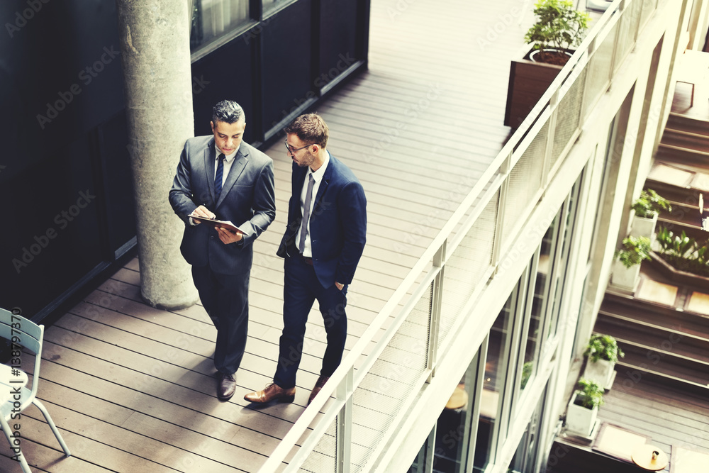 Businessman Walking Discussion Talking Work Concept