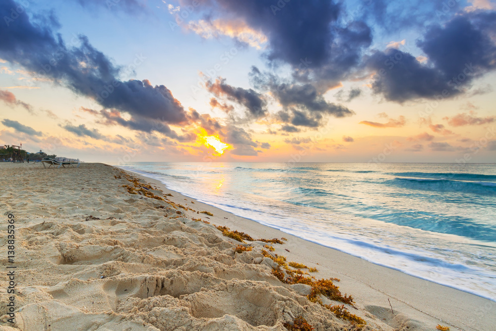 Sunrise on the beach of Playa del Carmen at caribbean sea, Mexico