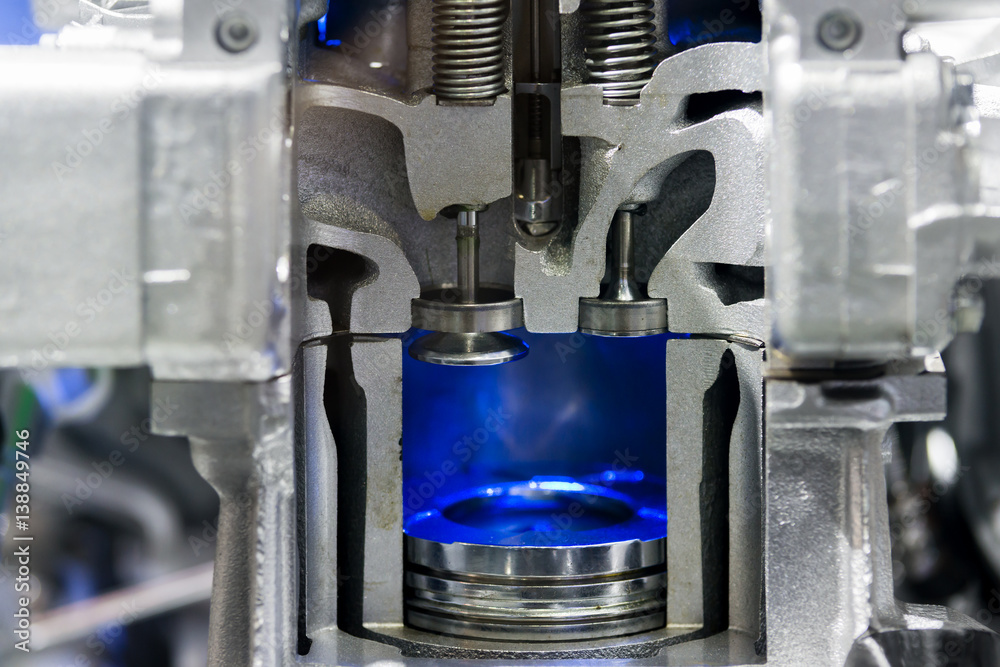 Piston diesel engine at cross section in car. Close up at piston.