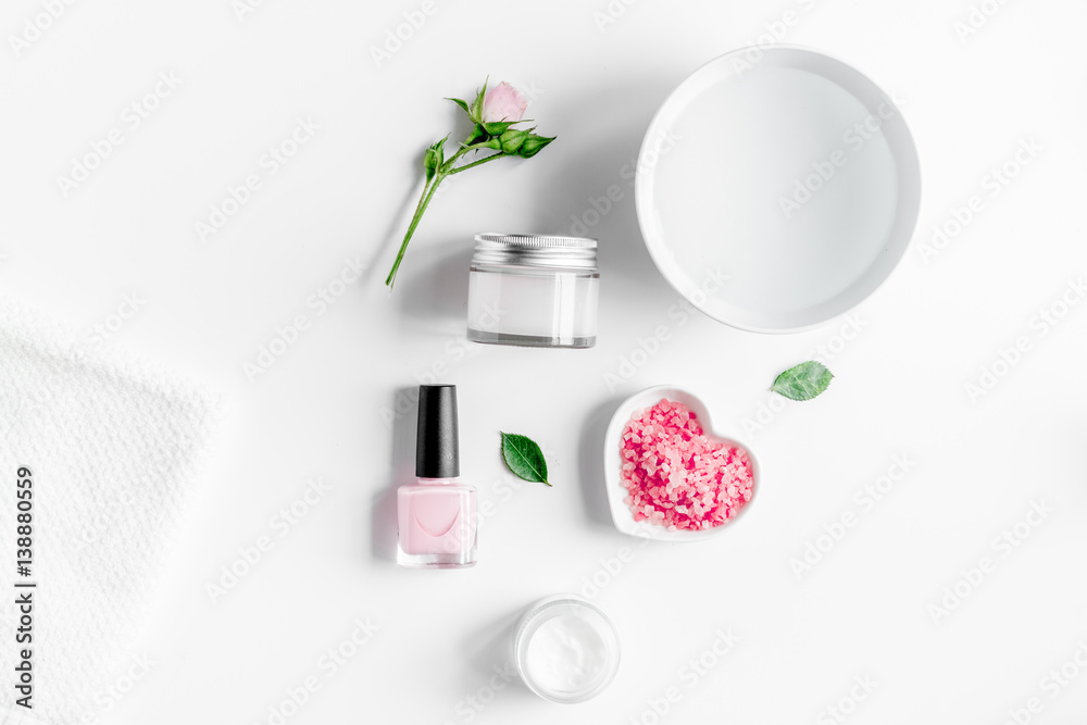 salt and cream for nail care in spa top view