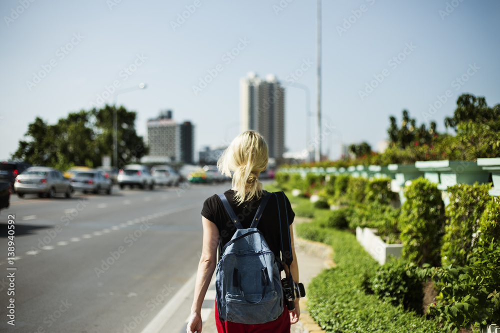 Women Walking Streetside Caucasian Camrea Traveler Concept